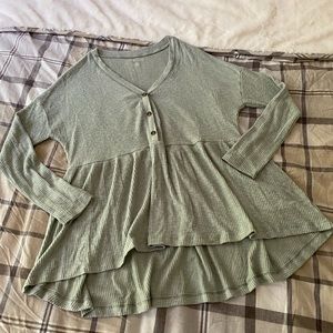 Peplum long sleeve top